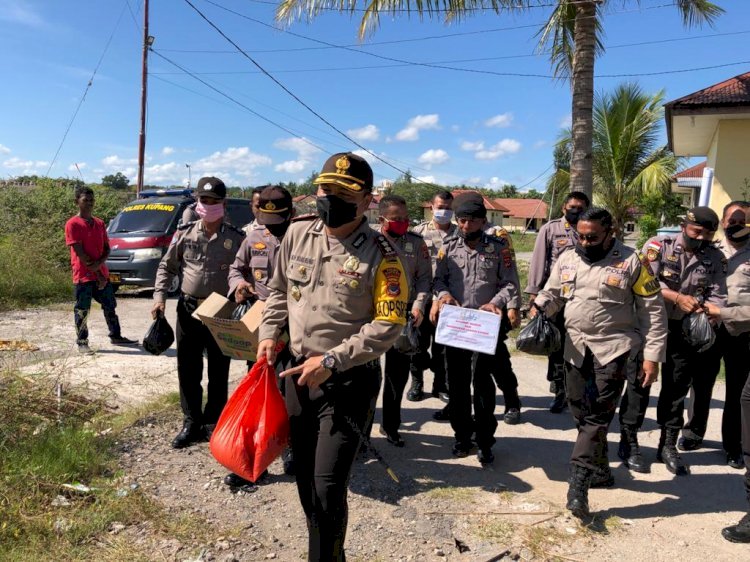 Kapolres berikan bantuan sembako ke 10 Kk terdampak covid- 19