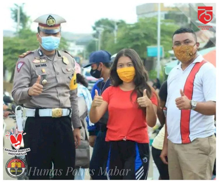 Polres Mabar bersama AMM Bagikan Masker di Pasar Batu Cermin