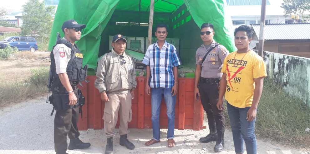 Personel Polres Sumtim Kawal Distribusi Surat Suara