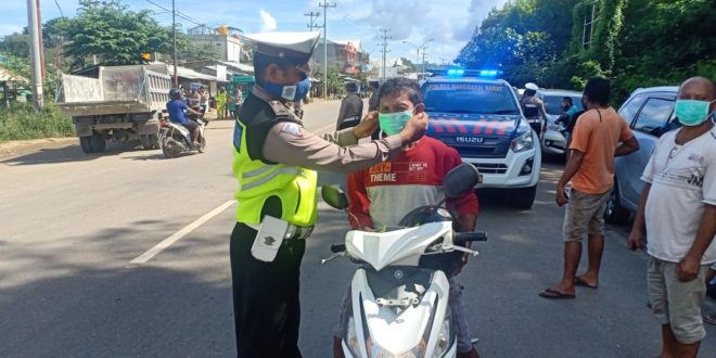 Satlantas Polres Mabar Ajak Pengendara Motor Gunakan Masker